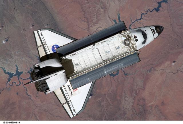 NASA image: STS-110 Shuttle Atlantis separates from the ISS following undocking, Expedition Four
