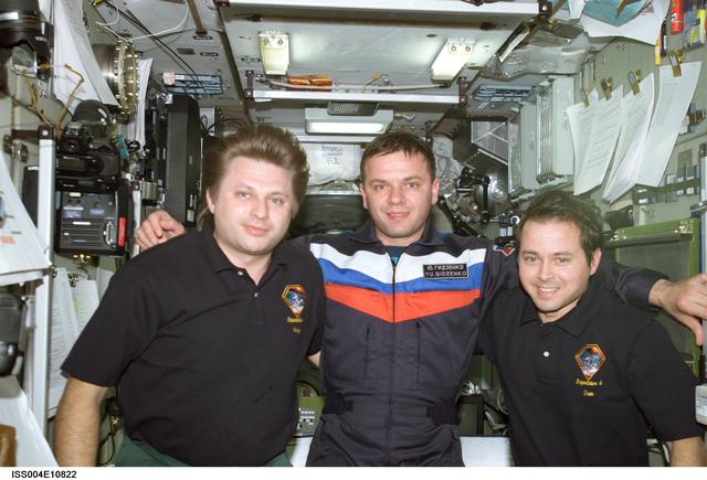 NASA image: Onufrienko, Gidzenko, and Bursch group photo in Zvezda SM during Expedition Four