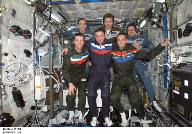 NASA image: Soyuz 4 taxi-3 flight and Expedition Four crews pose for group photo in U.S. Lab