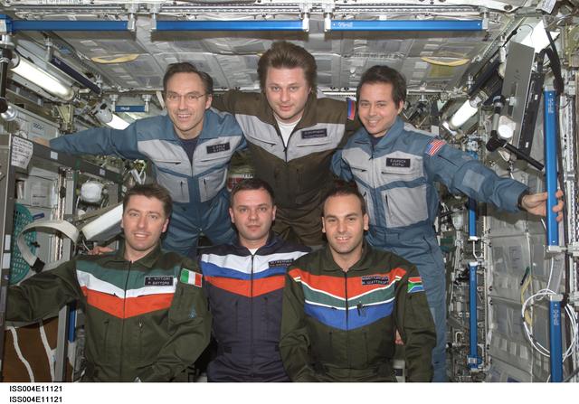 NASA image: Soyuz 4 taxi-3 flight and Expedition Four crews pose for group photo in U.S. Lab
