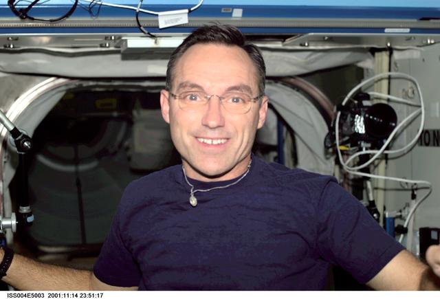 NASA image: Carl Walz smiles for the camera in the U.S. Laboratory during Expedition Four