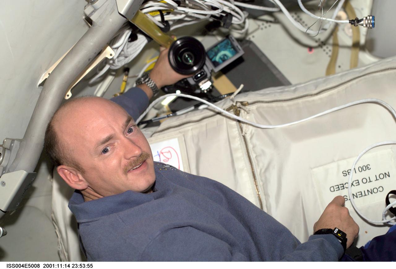 ISS004-E-5008 (December 2001) --- Astronaut Mark E. Kelly, STS-108 pilot, is photographed on the International Space Station (ISS). The image was taken with a digital still camera.