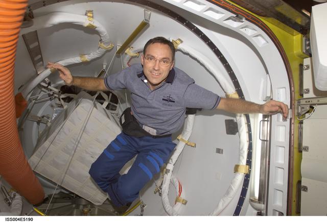 NASA image: Walz in the Quest Airlock during Expedition Four unpacking and stowage OPS