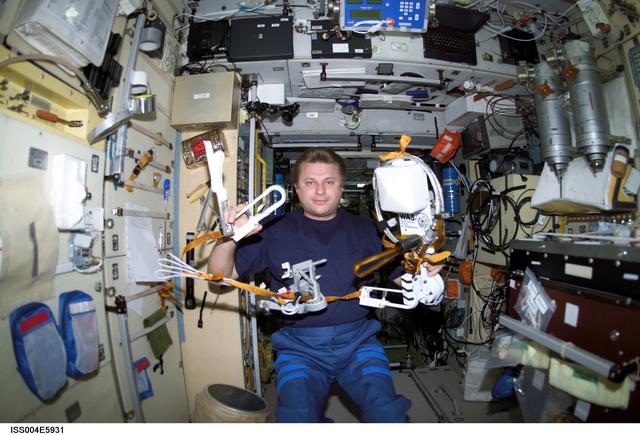 NASA image: Onufrienko holds the Amateur Radio (HAM) WA3 Antenna Assembly, Expedition Four