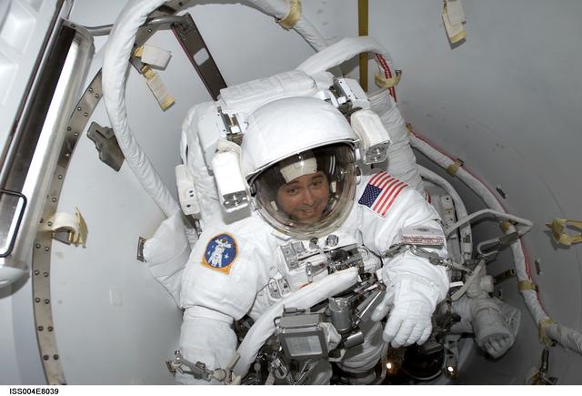 NASA image: Bursch and Walz in Quest Airlock for EVA 3, Expedition Four