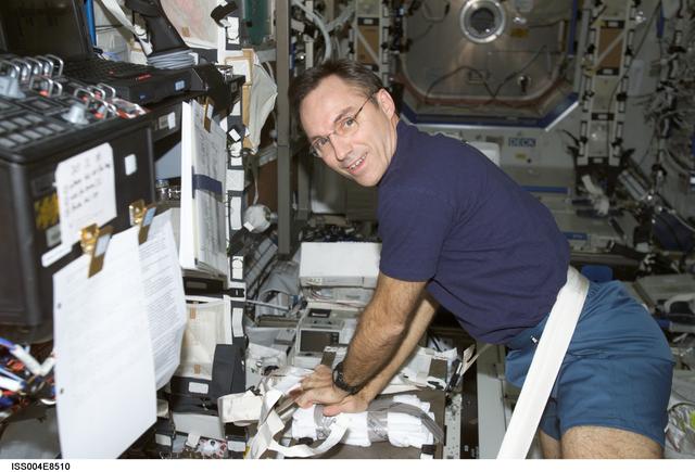NASA image: Walz practices CPR in the U.S. Laboratory during Expedition Four