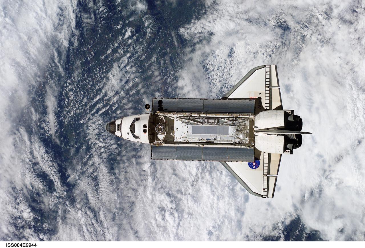 ISS004-E-9944 (10 April 2002) --- The Space Shuttle Atlantis prepares to dock with the International Space Station (ISS) during the STS-110 mission. Aboard Atlantis are astronauts Michael J. Bloomfield, mission commander; Stephen N. Frick, pilot; Rex J. Walheim, Ellen Ochoa, Lee M. E. Morin, Jerry L. Ross, and Steven L. Smith, all mission specialists. The STS-110 crewmembers are delivering the S0 (S-zero) truss, which is visible in Atlantis&#0146; payload bay. This image was taken by an Expedition Four crewmember.