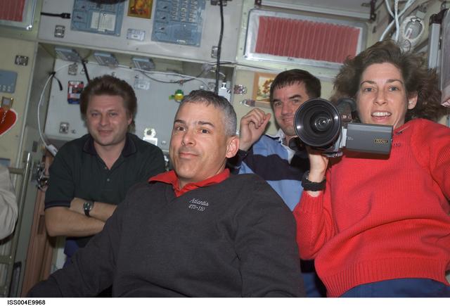 NASA image: STS-110 and Expedition Four crews gather in the Zvezda SM on first day of joint OPS
