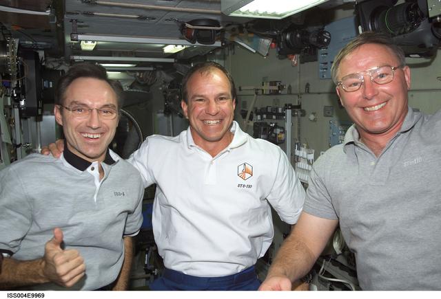 NASA image: STS-110 and Expedition Four crewmembers in the Zvezda SM on first day of joint OPS