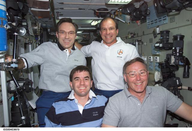 NASA image: STS-110 and Expedition Four crewmembers in the Zvezda SM on first day of joint OPS