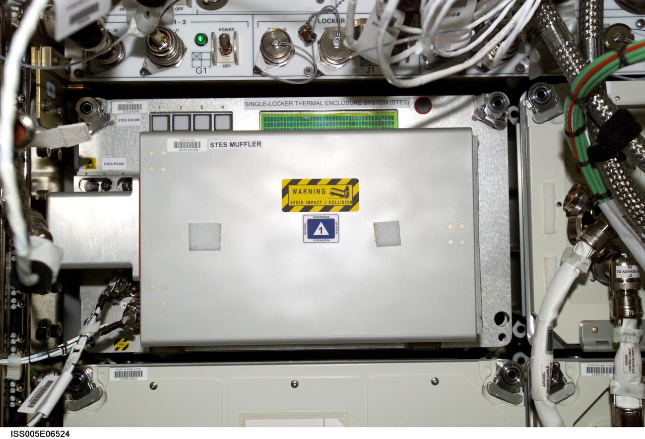 iss005e06524 (7/2/2002) --- View of the Single-Locker Thermal Enclosure System (STES), located on the Expedite the Processing of Experiments to the Space Station (EXPRESS) Rack 4 in the Destiny / U.S. Laboratory.