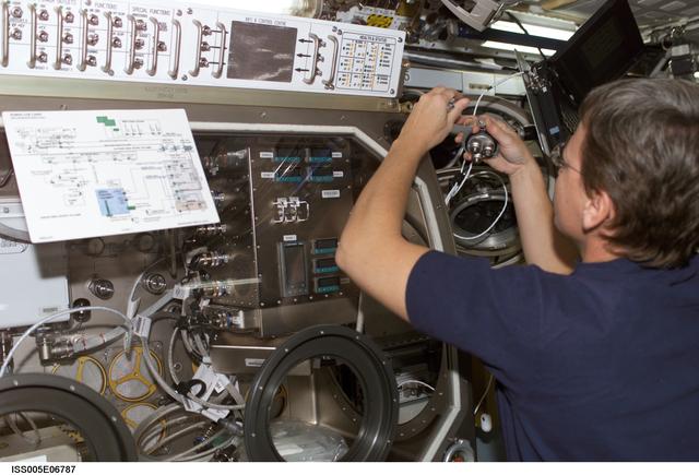 Science Officer Whitson installs SUBSA in MSG