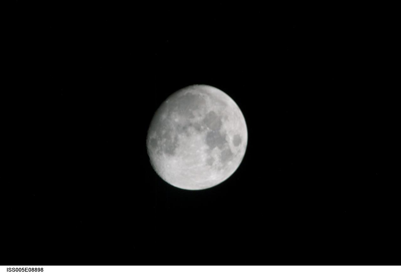 ISS005-E-08898 (21 July 2002) --- View of a gibbous Moon photographed by one of the crewmembers aboard the International Space Station (ISS) for Expedition Five.