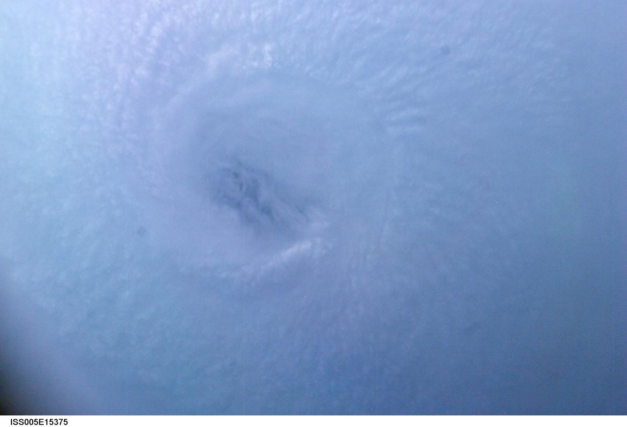 ISS005- E-15375  (22 September 2002) --- This digital still camera's picture, taken from the International Space Station (ISS) on  September 22, 2002, shows the central eye of Hurricane Isidore. The eye become less defined as the hurricane stalled and weakened over the Yucatan Peninsula near Merida.  Onboard the orbital outpost for the Expedition Five mission are cosmonauts Valery G. Korzun, commander,  and Sergei Y. Treschev, flight engineer, both with Rosaviakosmos; and astronaut Peggy A. Whitson, flight engineer.