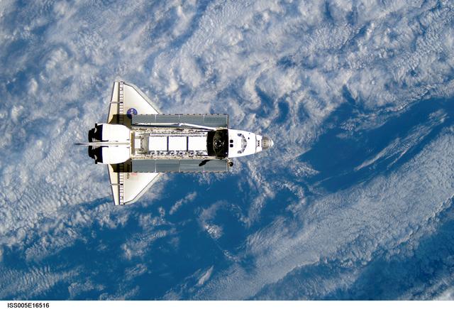 NASA image: Atlantis during STS-112 approach to ISS during Expedition Five