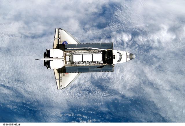 NASA image: Atlantis during STS-112 approach to ISS during Expedition Five