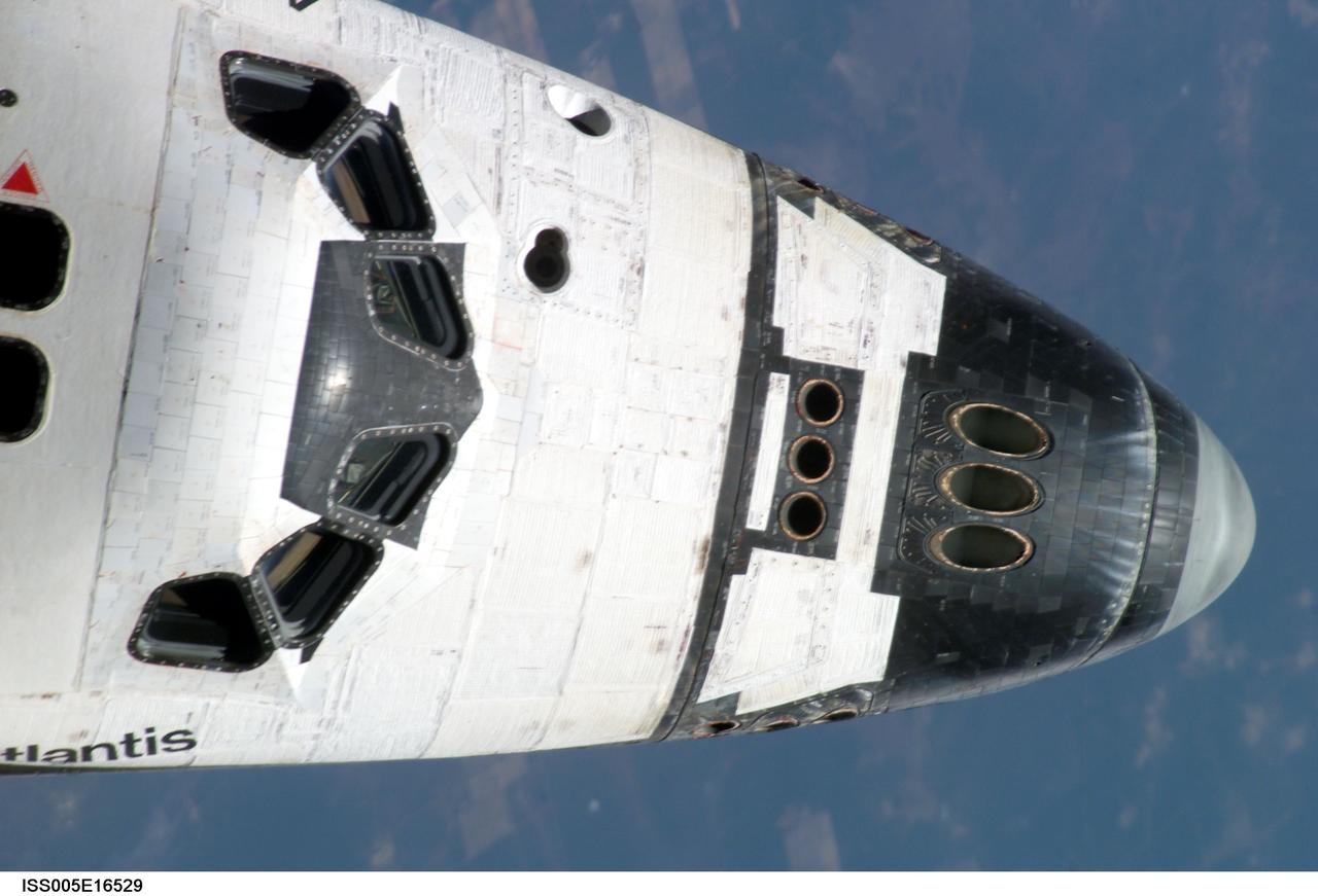 ISS005-E-16529 (9 October 2002) --- The forward section of the Space Shuttle Atlantis was photographed by an Expedition Five crewmember aboard the International Space Station (ISS) during rendezvous and docking operations. Docking occurred at 10:17 a.m. (CDT) on October 9, 2002.