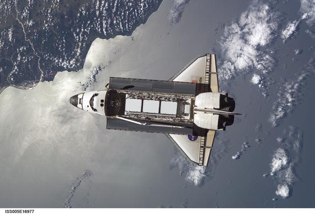 NASA image: Atlantis during STS-112 approach to ISS during Expedition Five