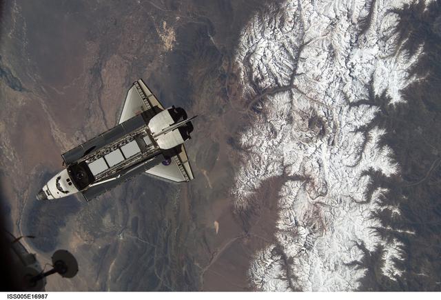 NASA image: Atlantis during STS-112 approach to ISS during Expedition Five