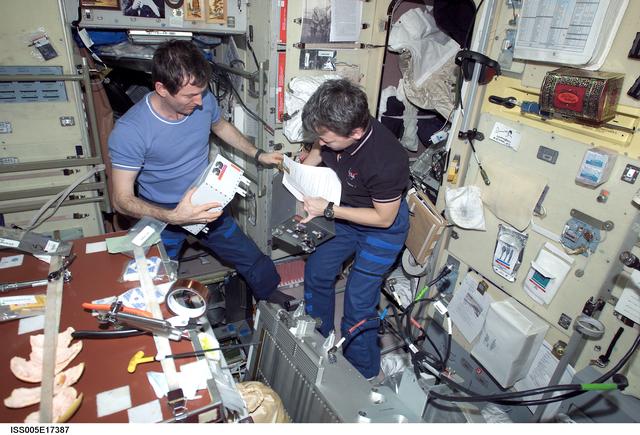 NASA image: Whitson and Treschev perform maintenance on the TVIS