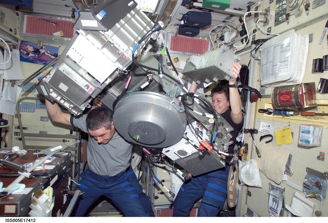 NASA image: Expedition Five crew perform maintenance on the TVIS