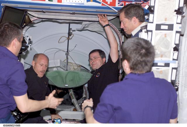 NASA image: Expedition Five crewmembers greet Expedition Six and STS-113 crewmembers