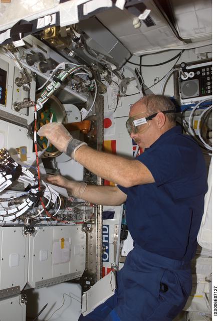 NASA image: Expedition Six Commander Bowersox working with Zeolite Crystal Growth in U.S. Lab