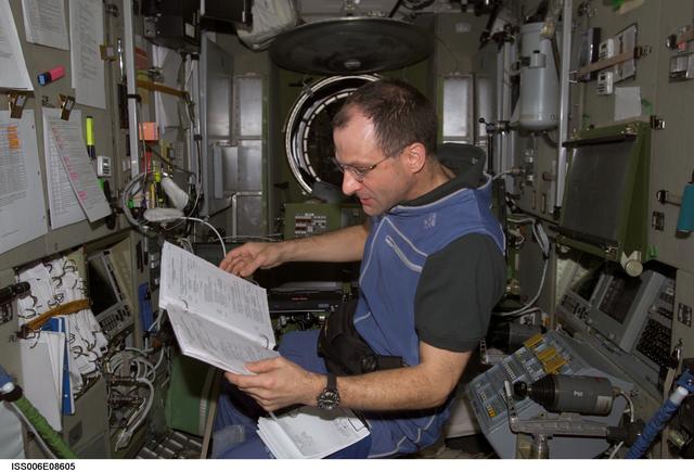 NASA image: Expedition Six Flight Engineer Pettit is looking at procedures checklist in the Zvezda Service Module