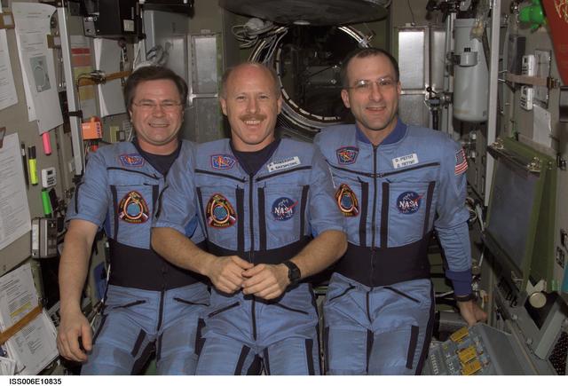 NASA image: Expedition Six crewmembers pose for a group photo in the Service Module