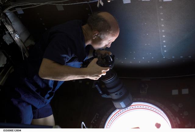 NASA image: Bowersox takes pictures of Earth from the nadir window of Destiny during Expedition Six
