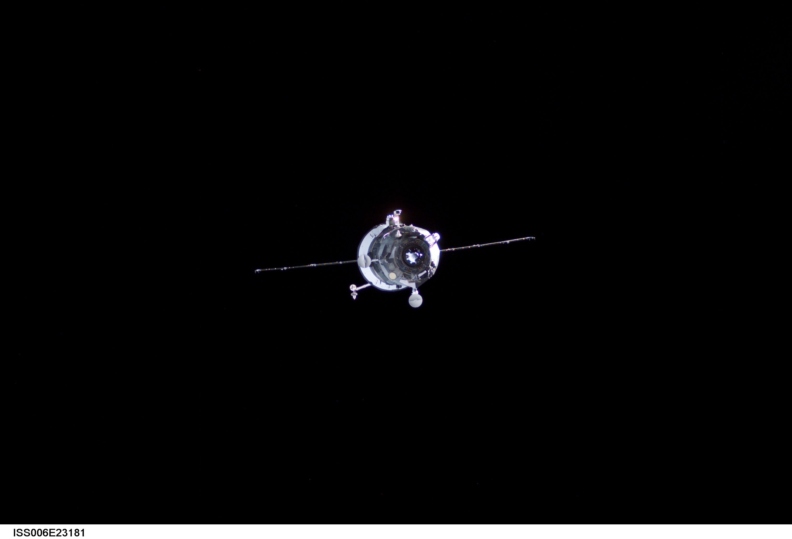 ISS006-E-23181 (4 February 2003) --- Backdropped by the blackness of space, an unpiloted Progress supply vehicle approaches the aft port of the Zvezda Service Module (out of frame) on the International Space Station (ISS), completing a two-day automated flight. The Progress 10 resupply craft, which launched from the Baikonur Cosmodrome in Kazakhstan on Sunday, February 2, 2003, carried more than a ton of food, fuel and equipment for the Expedition Six crewmembers.