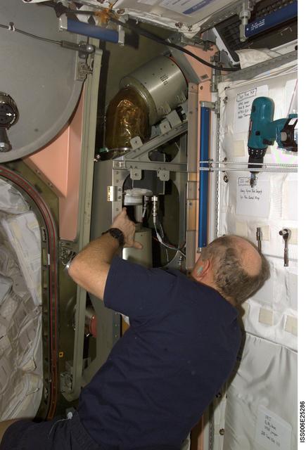 NASA image: Bowersox works on the IMV system in Node 1 during Expedition Six