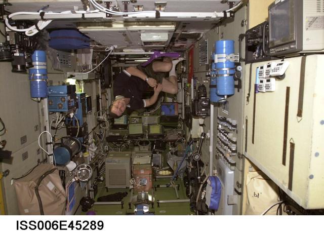 NASA image: Flight Engineer Nikolai Budarin floats in the SM during Expedition Six