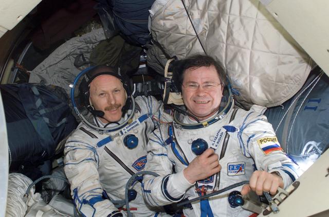 NASA image: Bowersox and Budarin wearing Russian Sokol suit in Soyuz Spacecraft during Expedition Six