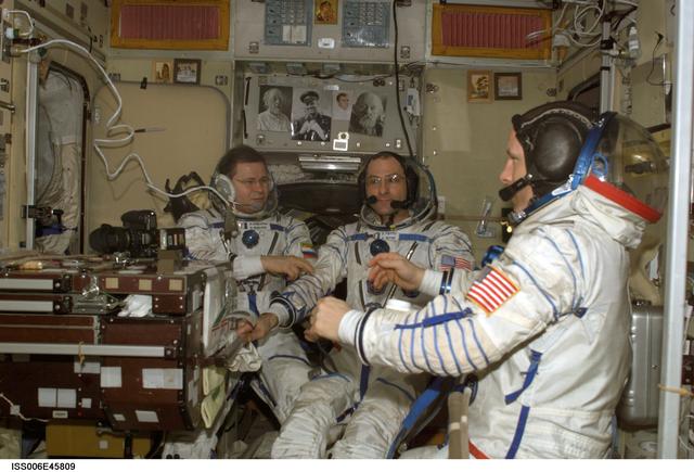 NASA image: Informal portrait of Pettit, Budarin, and Bowersox in the SM during Expedition Six