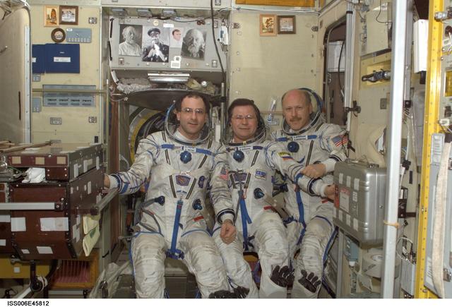 NASA image: Informal portrait of Pettit, Budarin, and Bowersox in the SM during Expedition Six