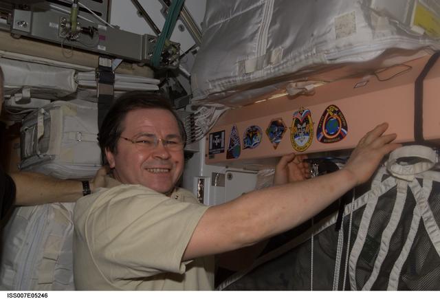 NASA image: Expedition Six crewmember Budarin with mission patch in Unity /Node 1