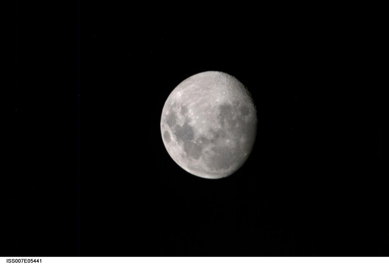 ISS007-E-05441 (13 May 2003) --- View of a gibbous Moon photographed by an Expedition Seven crewmember on board the International Space Station (ISS). The image was taken two days prior to the occurrence of a total lunar eclipse, which was photographed by astronaut Edward T. Lu, NASA ISS science officer.