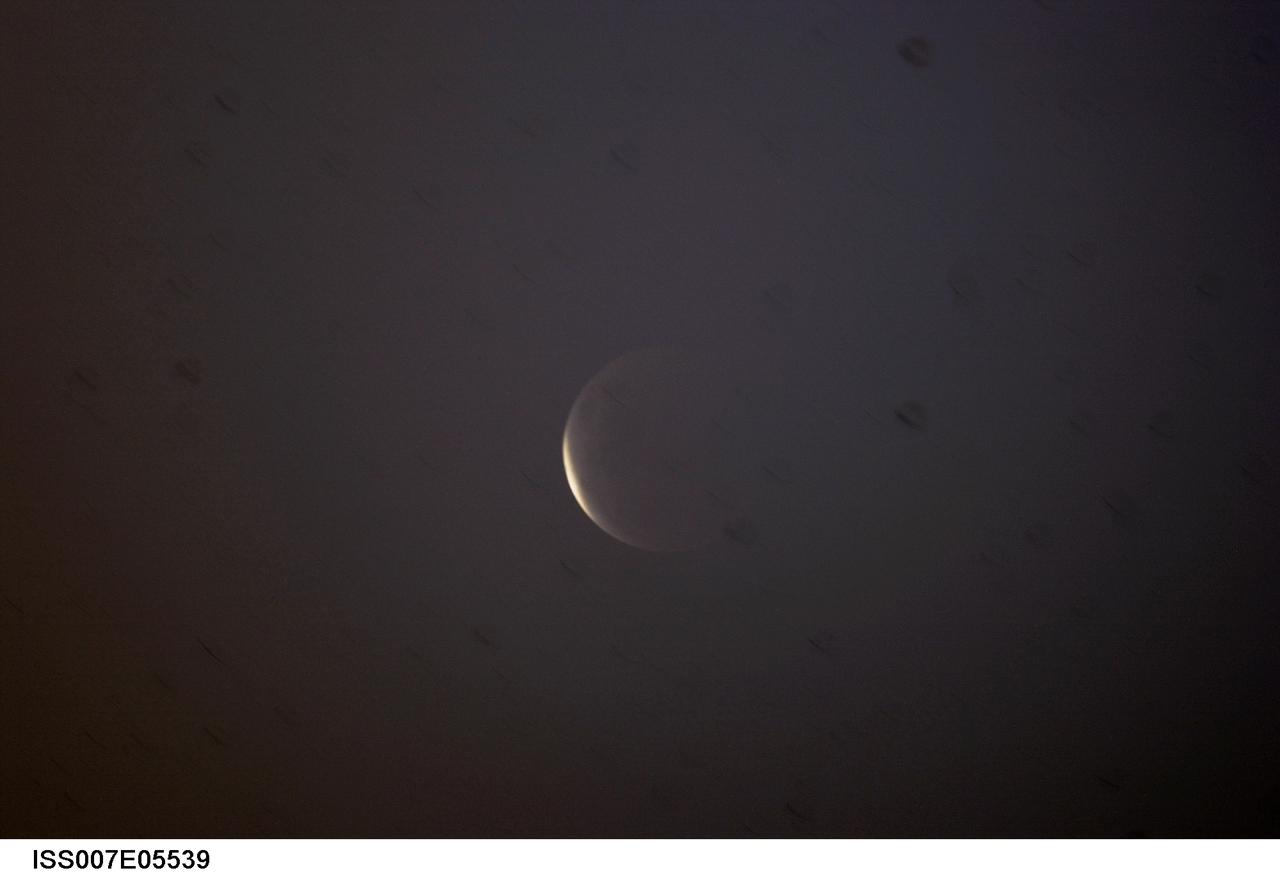 ISS007-E-05539 (15 May 2003) --- This digital image was taken near the time of a total lunar eclipse through a window on the International Space Station (ISS) by Expedition Seven NASA ISS Science Officer Ed Lu.