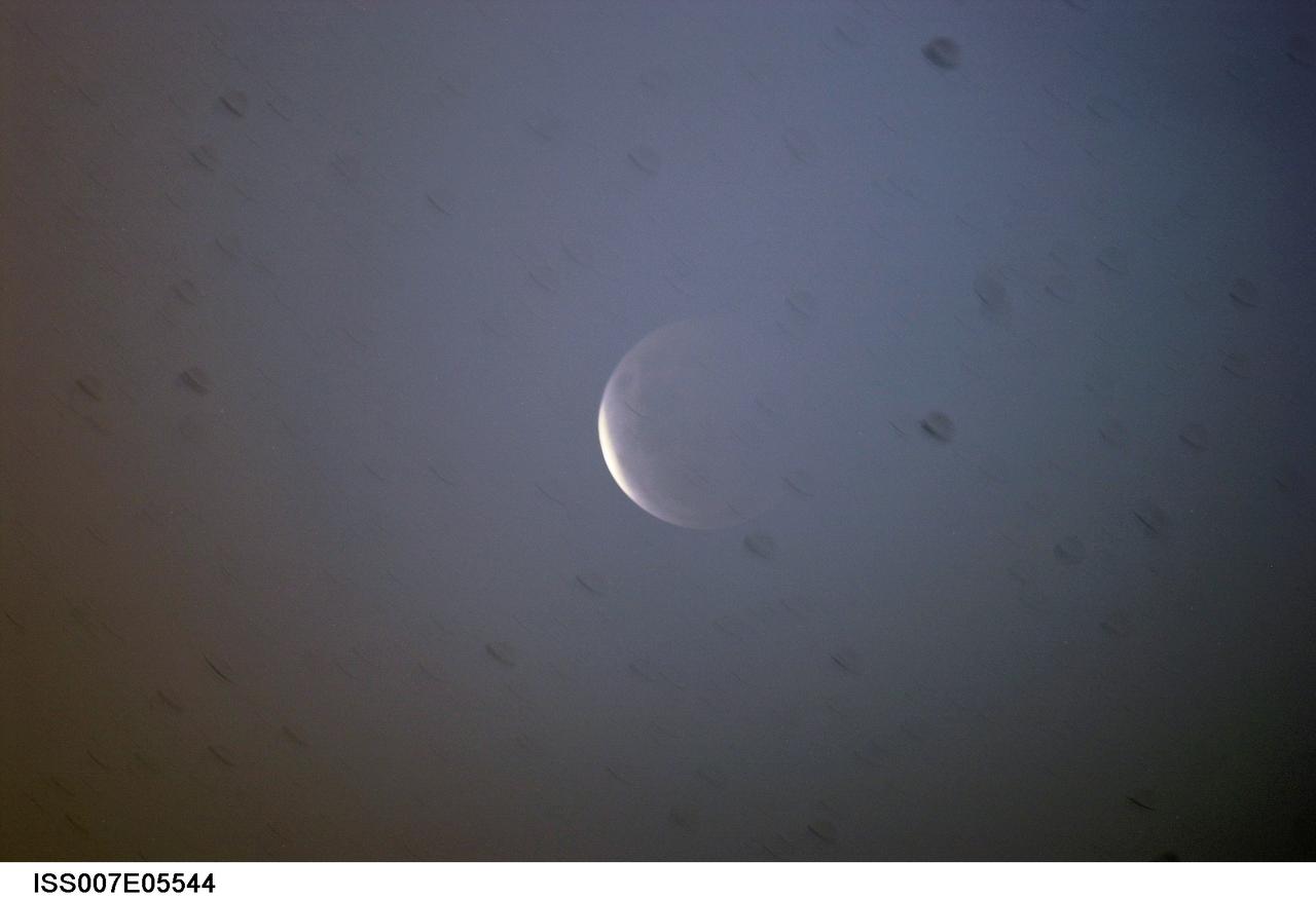 ISS007-E-05544 (15 May 2003) --- This digital image was taken near the time of a total lunar eclipse through a window on the International Space Station (ISS) by Expedition Seven NASA ISS Science Officer Ed Lu.