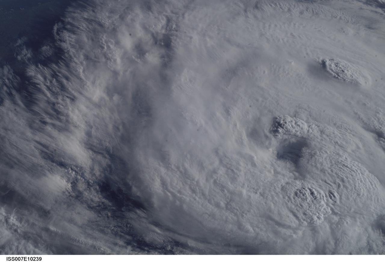 ISS007-E-10239 (15 July 2003) --- The crew of the International Space Station had a great seat from which to observe tropical storm Claudette as she turned into a hurricane and came ashore with high winds and heavy rains that drenched their Houston home base and other Texas areas. This digital image was recorded at 13:25:10 GMT, July 15, 2003.
