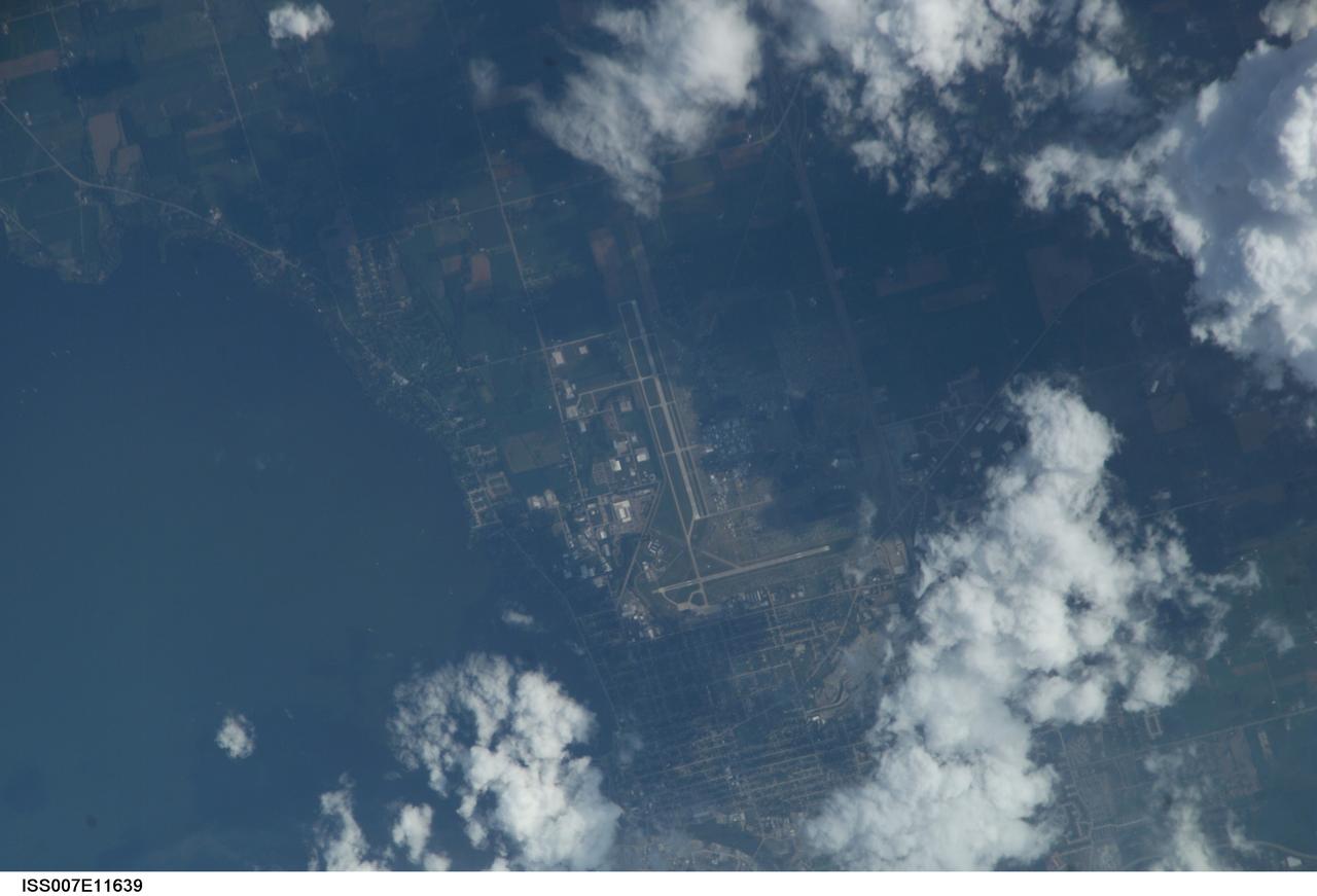 ISS007-E-11639 (2 August 2003) --- A nadir view, recorded with a digital still camera from the International Space Station orbiting Earth some 215 nautical miles overhead, shows the site of the 2003 Oshkosh air show, currently underway.