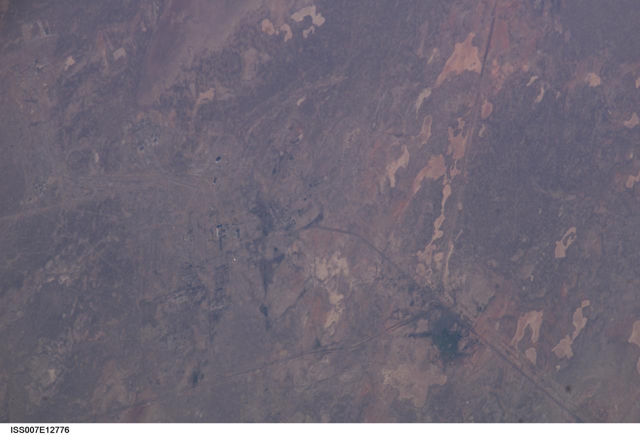 ISS007-E-12776 (15 August 2003) --- This digital still camera's image, recorded by one of the crewmembers on the International Space Station, shows the Baikonur Launch Complex in Kazakhstan.