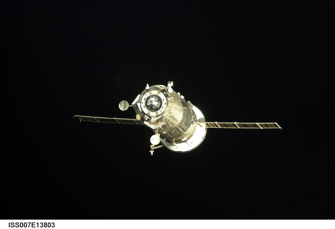 ISS007-E-13803 (30 August 2003) --- Backdropped by the blackness of space, an unpiloted Progress supply vehicle approaches the aft docking port (out of frame) on the Zvezda Service Module on the International Space Station (ISS). The Progress 12 resupply craft, which launched from the Baikonur Cosmodrome in Kazakhstan at 8:48 p.m. (CDT) on August 28, 2003, carried nearly three tons of food, fuel, water, supplies and scientific gear for the Expedition 7 crew aboard the Station. The Progress linked up with the Station at 10:40 p.m. (CDT) on August 30, 2003 as the two spacecraft were flying over Central Asia at an altitude of 240 statute miles.