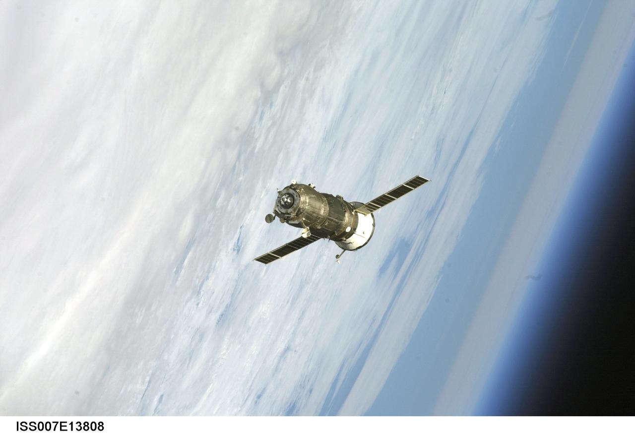 ISS007-E-13808 (30 August 2003) --- Backdropped by Earth&#0146;s horizon, an unpiloted Progress supply vehicle approaches the International Space Station (ISS). The Progress 12 resupply craft, which launched from the Baikonur Cosmodrome in Kazakhstan at 8:48 p.m. (CDT) on August 28, 2003, carried nearly three tons of food, fuel, water, supplies and scientific gear for the Expedition 7 crew aboard the Station. The Progress linked up with the Station at 10:40 p.m. (CDT) on August 30, 2003 as the two spacecraft were flying over Central Asia at an altitude of 240 statute miles.