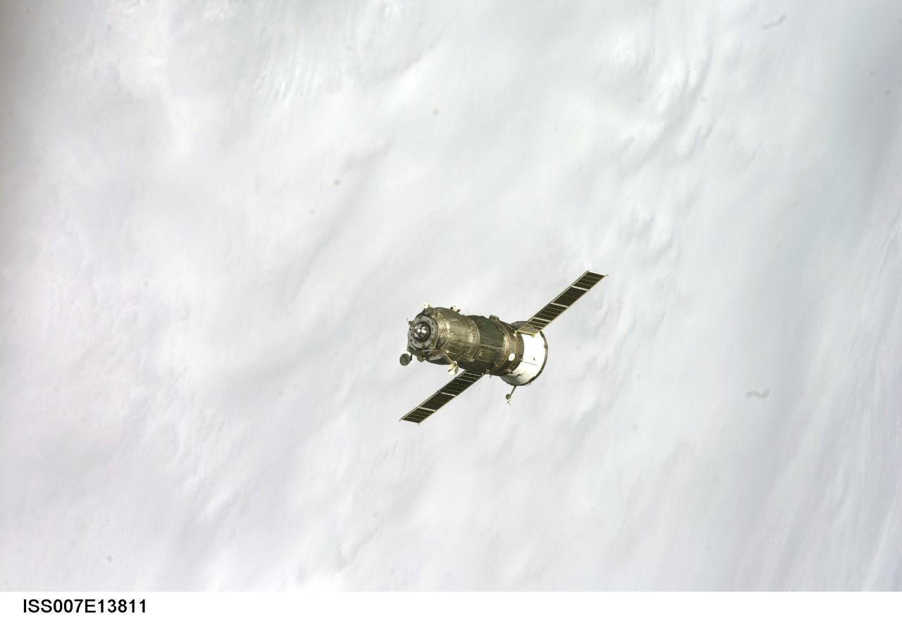 ISS007-E-13811 (30 August 2003) --- Backdropped by a blue and white Earth, an unpiloted Progress supply vehicle approaches the International Space Station (ISS). The Progress 12 resupply craft, which launched from the Baikonur Cosmodrome in Kazakhstan at 8:48 p.m. (CDT) on August 28, 2003, carried nearly three tons of food, fuel, water, supplies and scientific gear for the Expedition 7 crew aboard the Station. The Progress linked up with the Station at 10:40 p.m. (CDT) on August 30, 2003 as the two spacecraft were flying over Central Asia at an altitude of 240 statute miles.