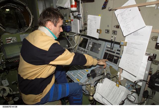 NASA image: Expedition Seven Malenchenko at Simvol-Ts controls in Zvezda module