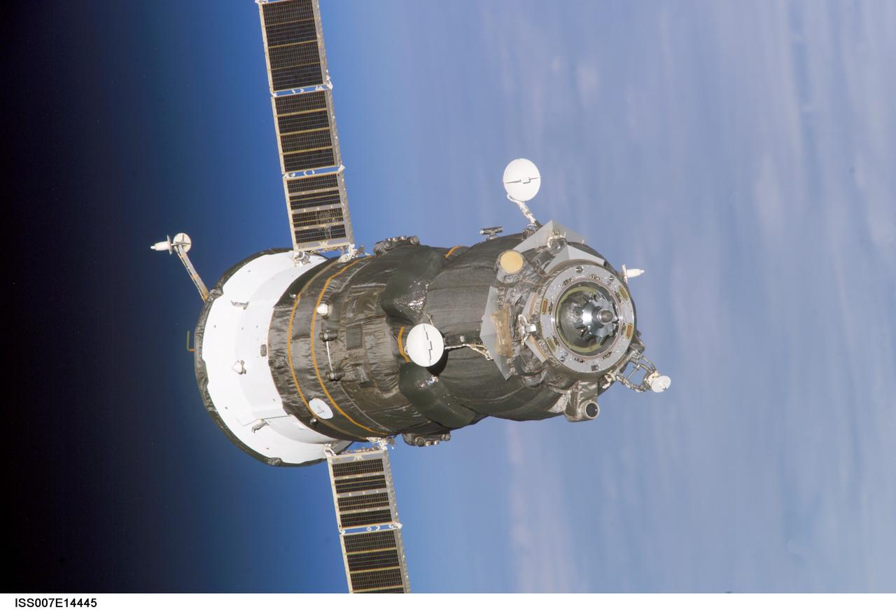 ISS007-E-14445 (4 September 2003) --- Backdropped by Earth&#0146;s horizon and the blackness of space, an unpiloted Progress 11 supply vehicle departs from the Pirs Docking Compartment on the International Space Station (ISS) at 2:42 p.m. (CDT) on September 4, 2003. It went on to spend another month alone in orbit, as part of a Russian scientific experiment. It was ultimately deorbited with its load of trash and unneeded equipment to burn in the Earth&#0146;s atmosphere.