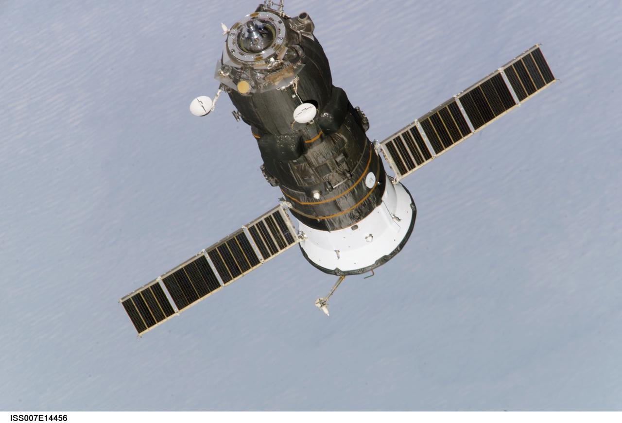 ISS007-E-14456 (4 September 2003) --- An unpiloted Progress 11 supply vehicle departs from the Pirs Docking Compartment on the International Space Station (ISS) at 2:42 p.m. (CDT) on September 4, 2003 for another month alone in orbit, as part of a Russian scientific experiment. It will then be deorbited with its load of trash and unneeded equipment and burn in the Earths atmosphere.