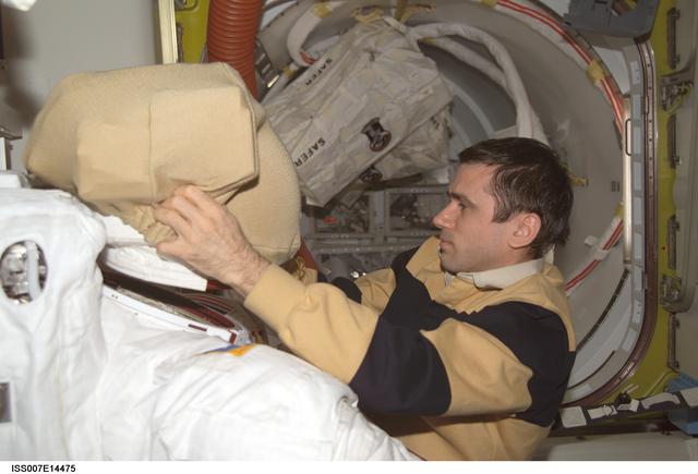 NASA image: Expedition Seven Malenchenko with EMU in Quest airlock
